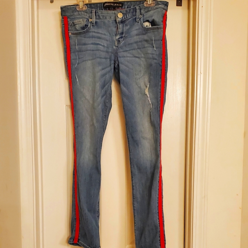 Express Distressed jeans w/pink stripe on the side. 36in length